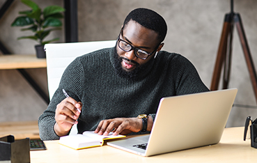 man working on laptop