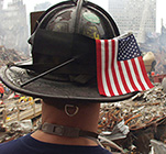 Rescue Worker with hard hat and American flag