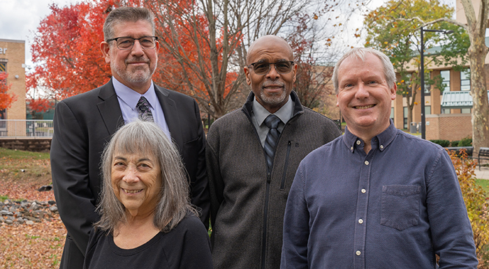 Back Row (Left to Right)-Linda Chrisler CPA, Senior Accountant; Michael Thornton, Scholarship Program Manager; John Quinn, Executive Administrative Associate and Greg Enloe, Executive Director for Development and the FCC Foundation