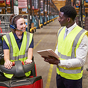 Man and woman in yellow vests