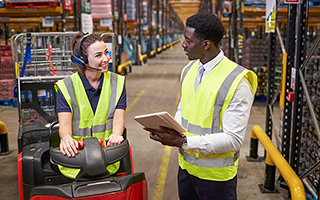 Man and woman in yellow vests